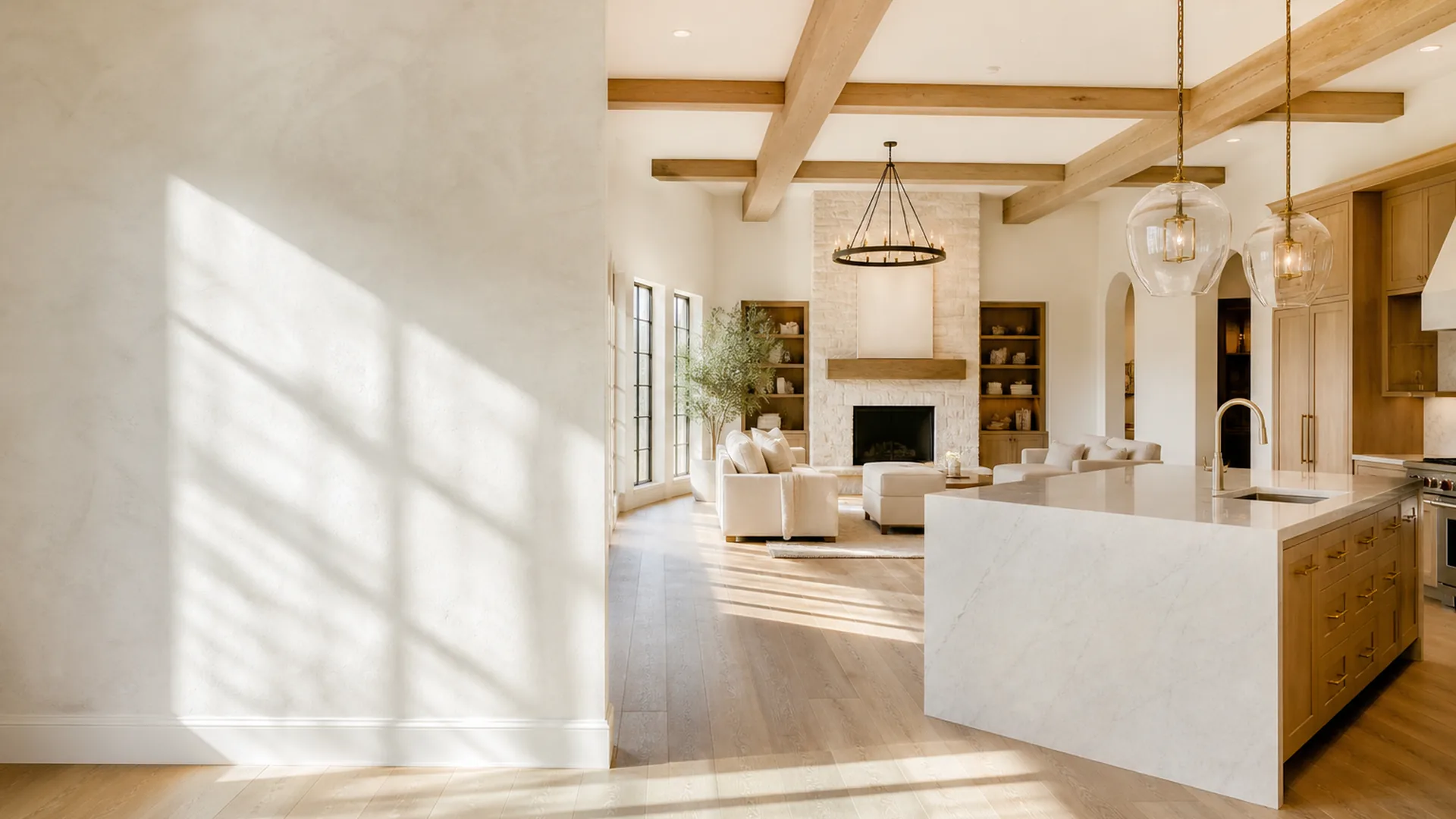 Illustration: Open-plan great room and kitchen with a beamed ceiling and large stone island